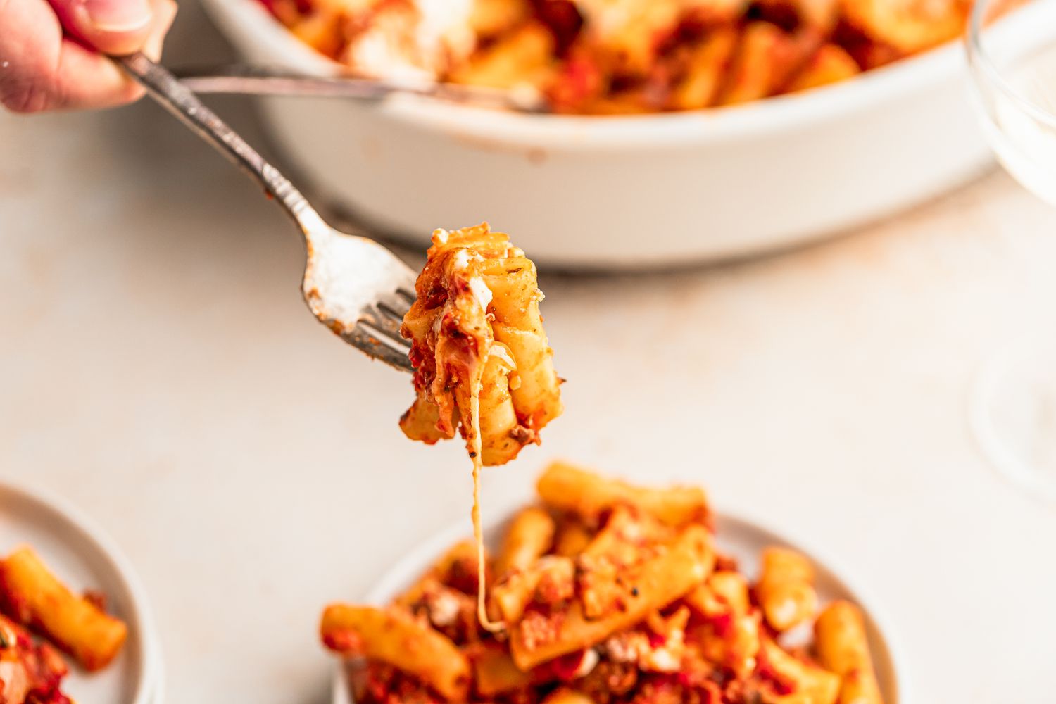 Casserole dish of cheesy baked ziti