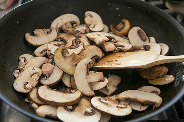 Mushrooms cooking in a pan 