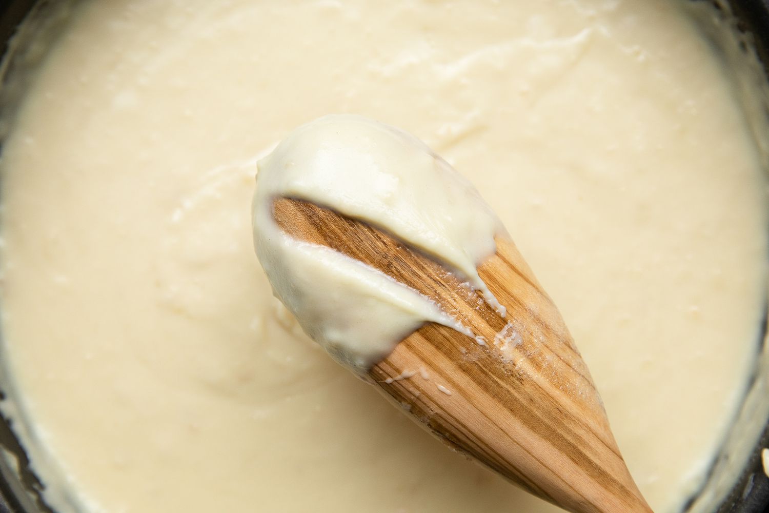 Spoon Streak Test Using to Check Consistency of Cassava Cake Topping