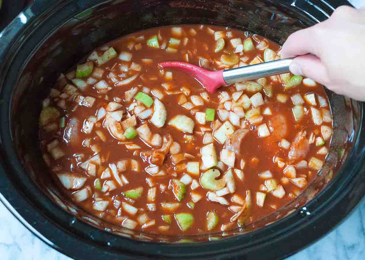 Stir together all the ingredients for crockpot chicken chili