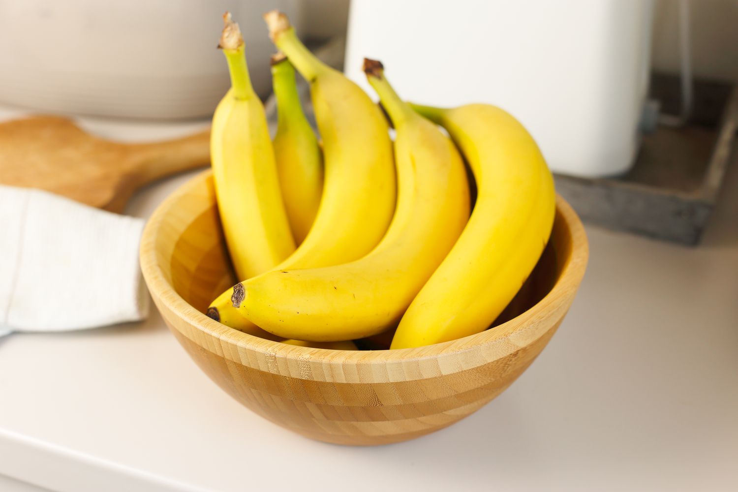 Bananas in a wooden bowl