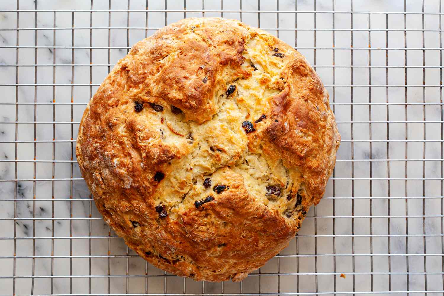 A baked loaf of Irish Soda Bread with currants