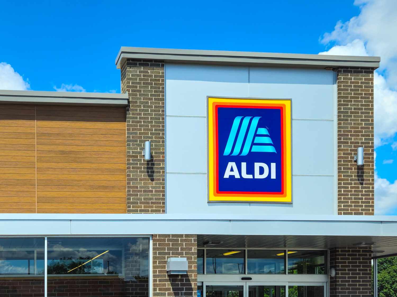 Aldi storefront with logo prominently displayed on the building