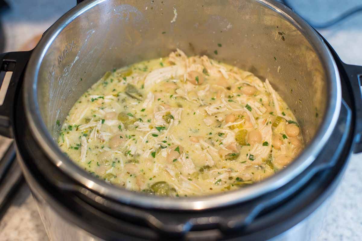 White chicken chili in the instant pot combine all the ingredients