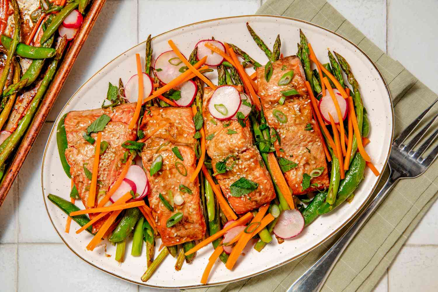 Overhead view of a platter of Jamie Oliver's 20-Minute Salmon Dinner