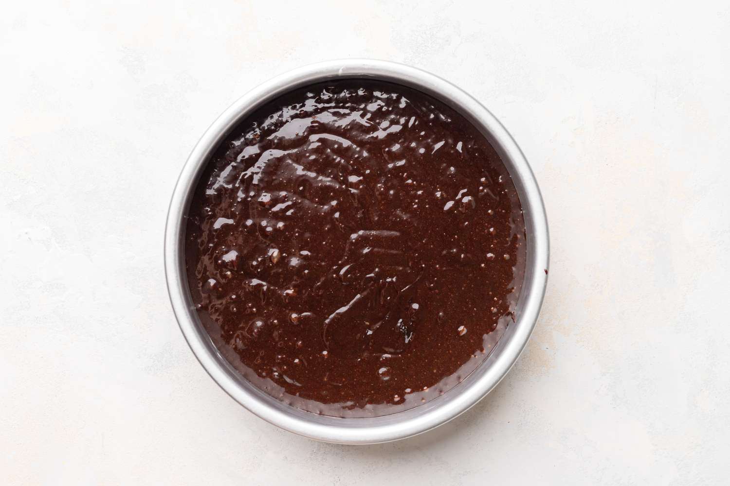 Flourless Chocolate Cake Batter in a Round Cake Pan