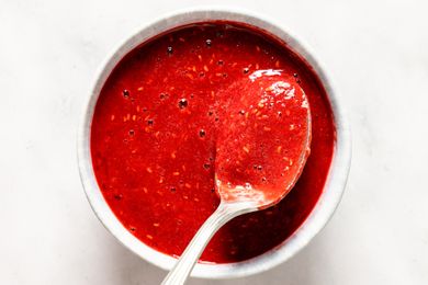 Raspberry-Soy Sauce in a small bowl with a spoon