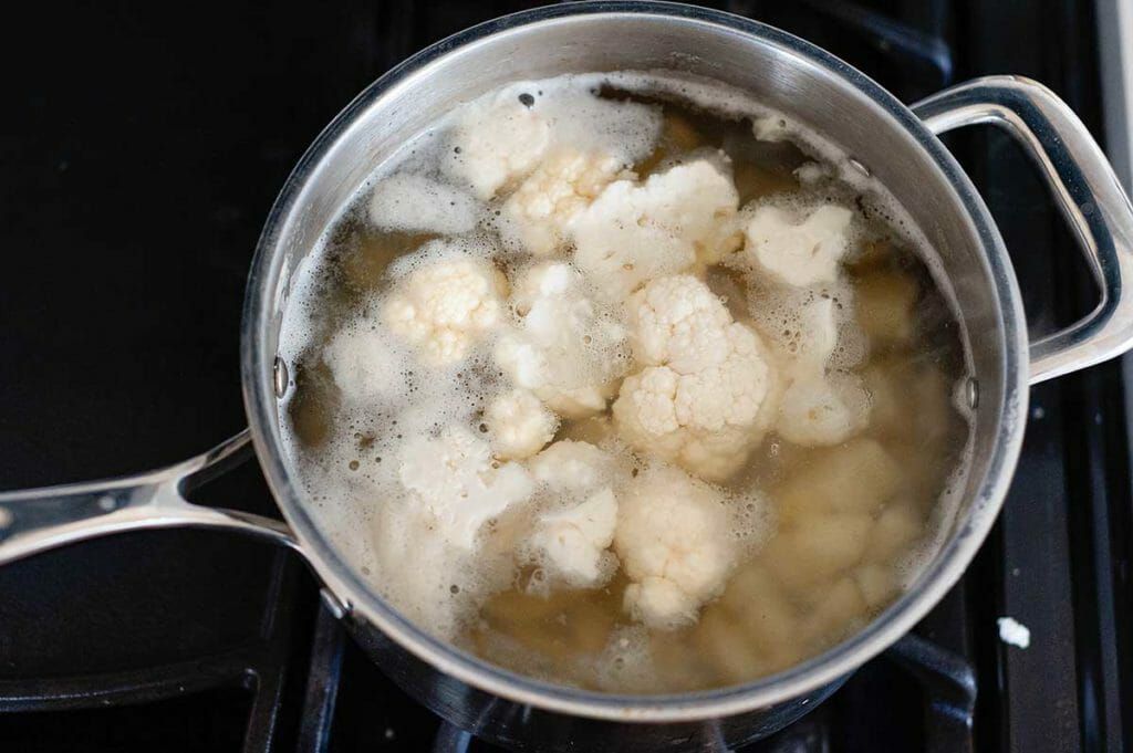 Boil cauliflower for cauliflower mash for shepherd's pie