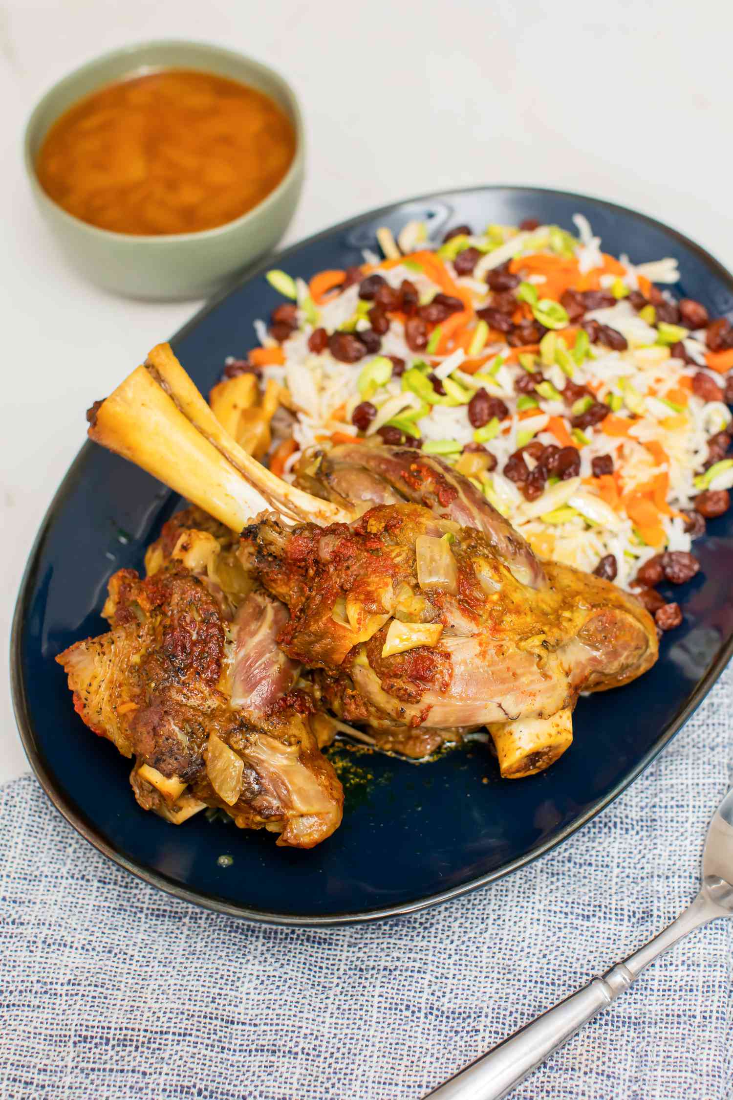 Kabuli Palao (Afghan Lamb Shanks with Rice, Carrots, and Raisins)