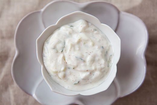 A bowl of cucumber mint raita, ready to serve.