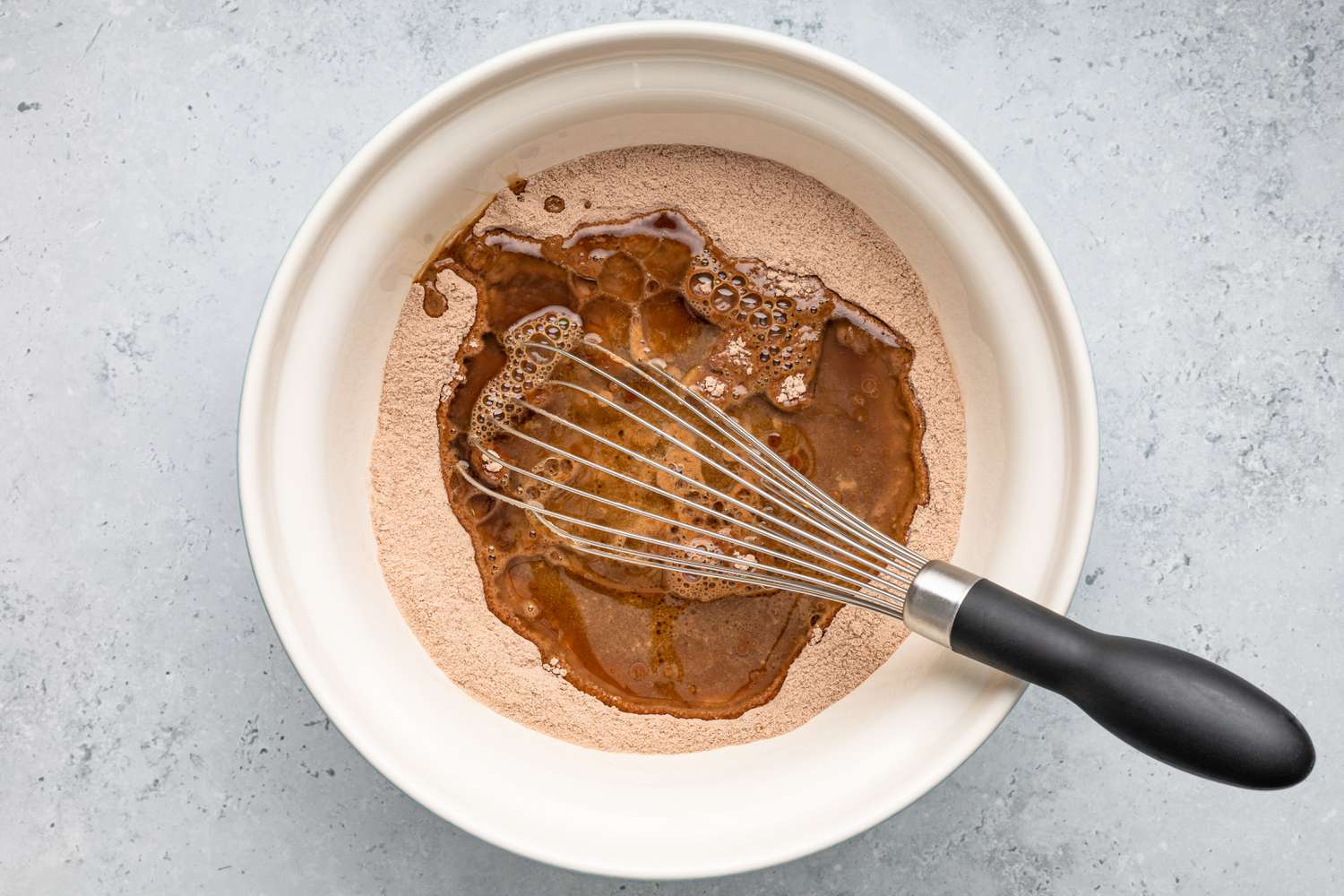 Bowl of Wet and Dry Ingredients (Not Whisked Together) for Double-Layer Chocolate Cake Recipe