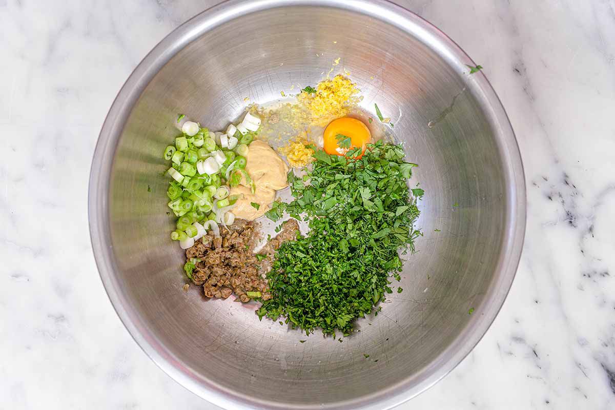 Healthy Fish Cake Recipe - ingredients in a silver mixing bowl