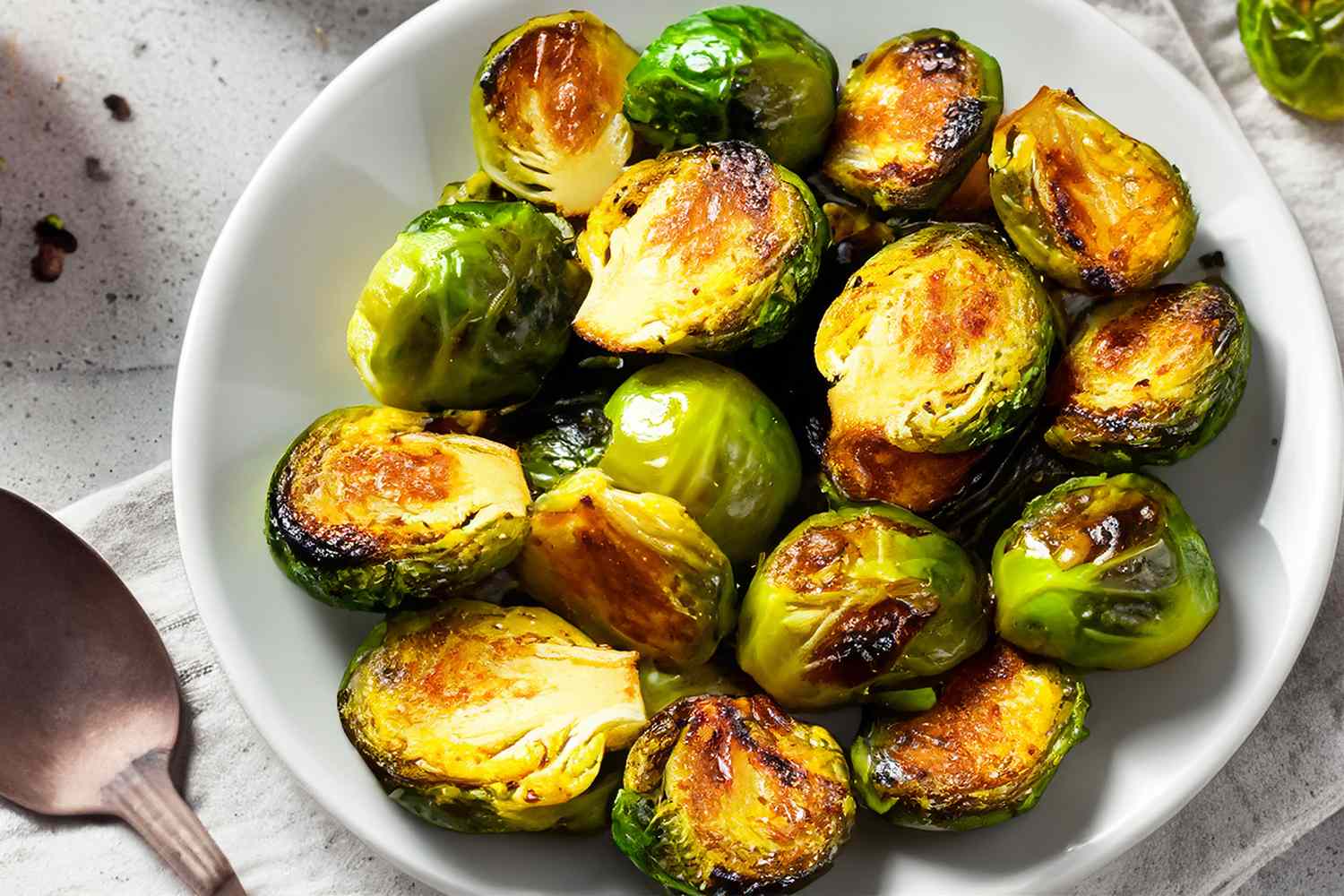 roasted brussels sprouts on a white platter