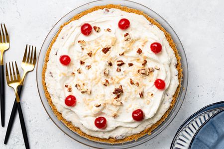 Million Dollar Pie, Forks on the Counter, and a Stack of Plates
