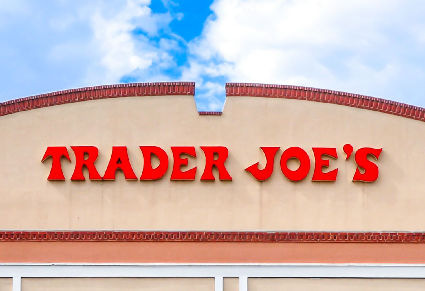 A Trader Joe's sign on a storefront