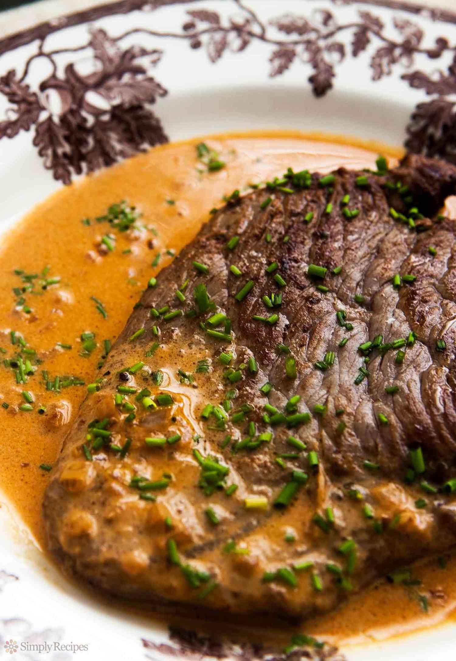 Steak Diane in a sauce on a plate 