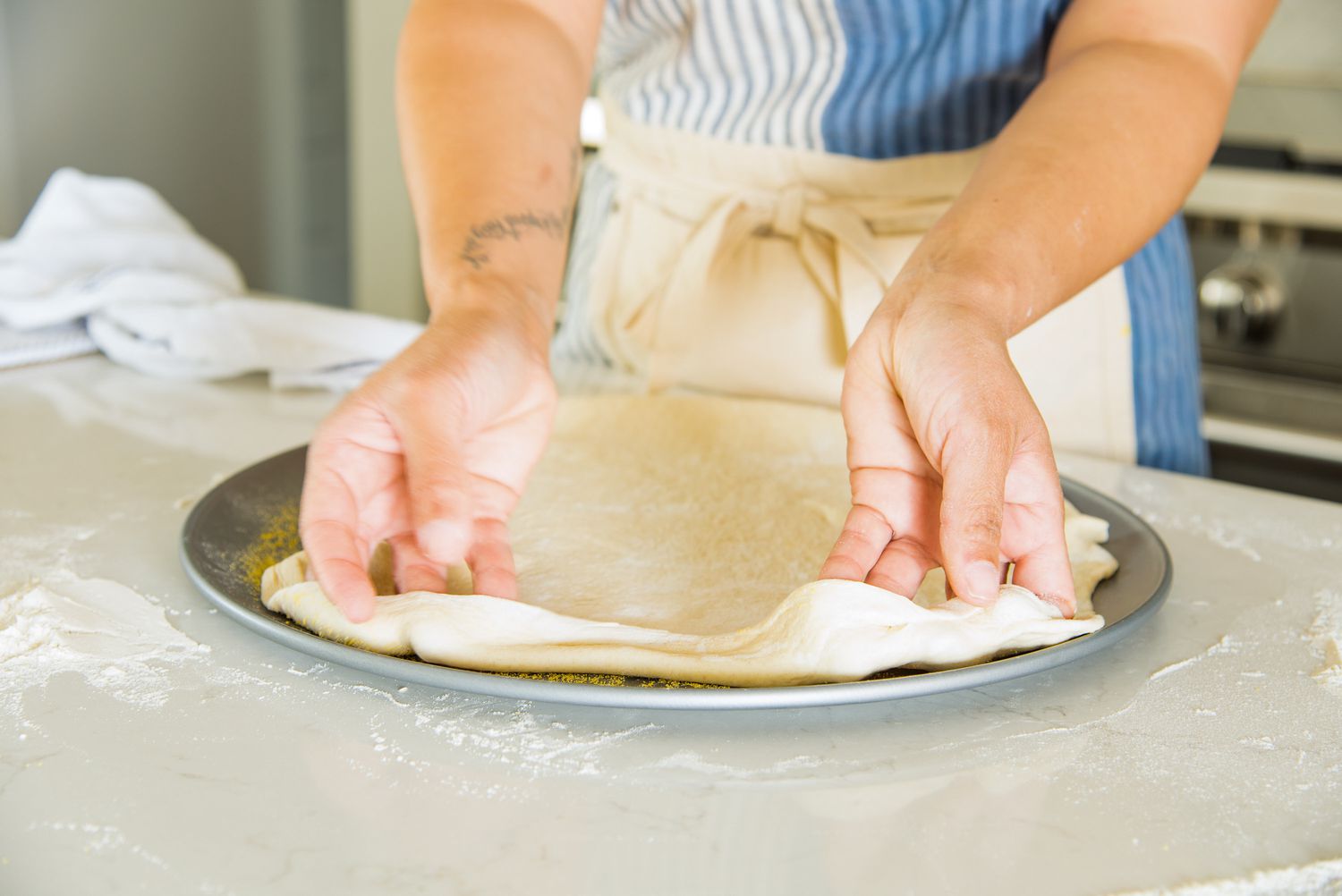 Cheeseburger Pizza Crust Carefully Stretched onto Pizza Pan 