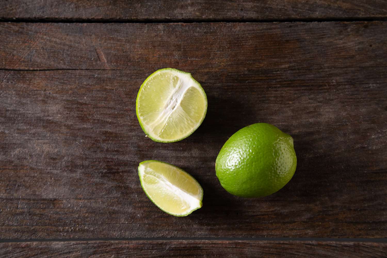 Limes on dark background