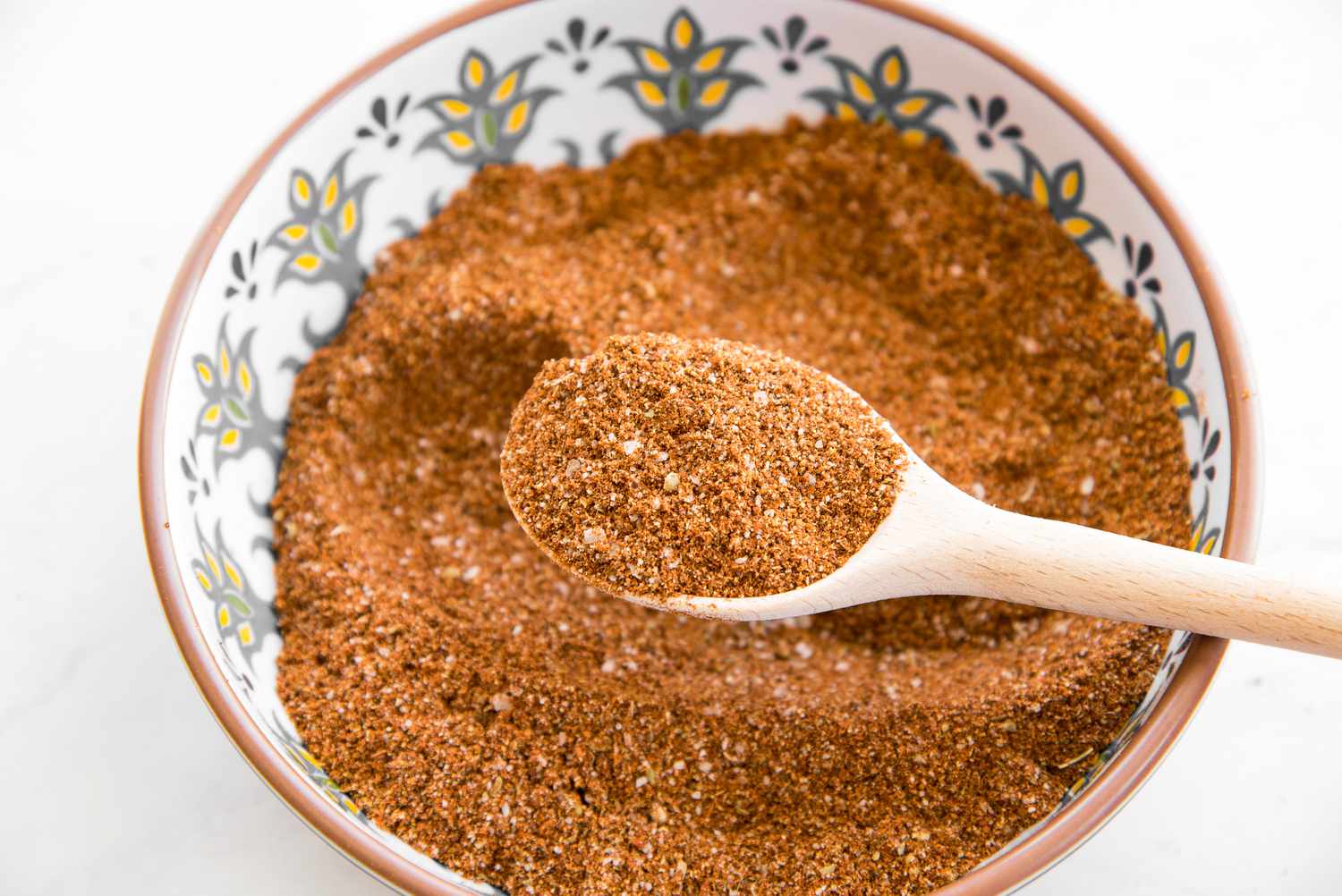 Taco Seasoning in Spoon and More in a Bowl 