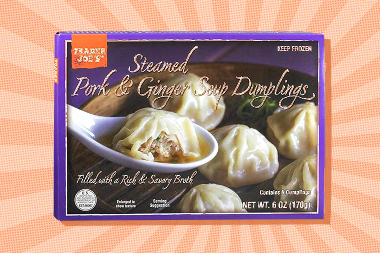 Trader Joes Steamed Pork Ginger Soup Dumplings packaging with visible dumplings and a spoon demonstration