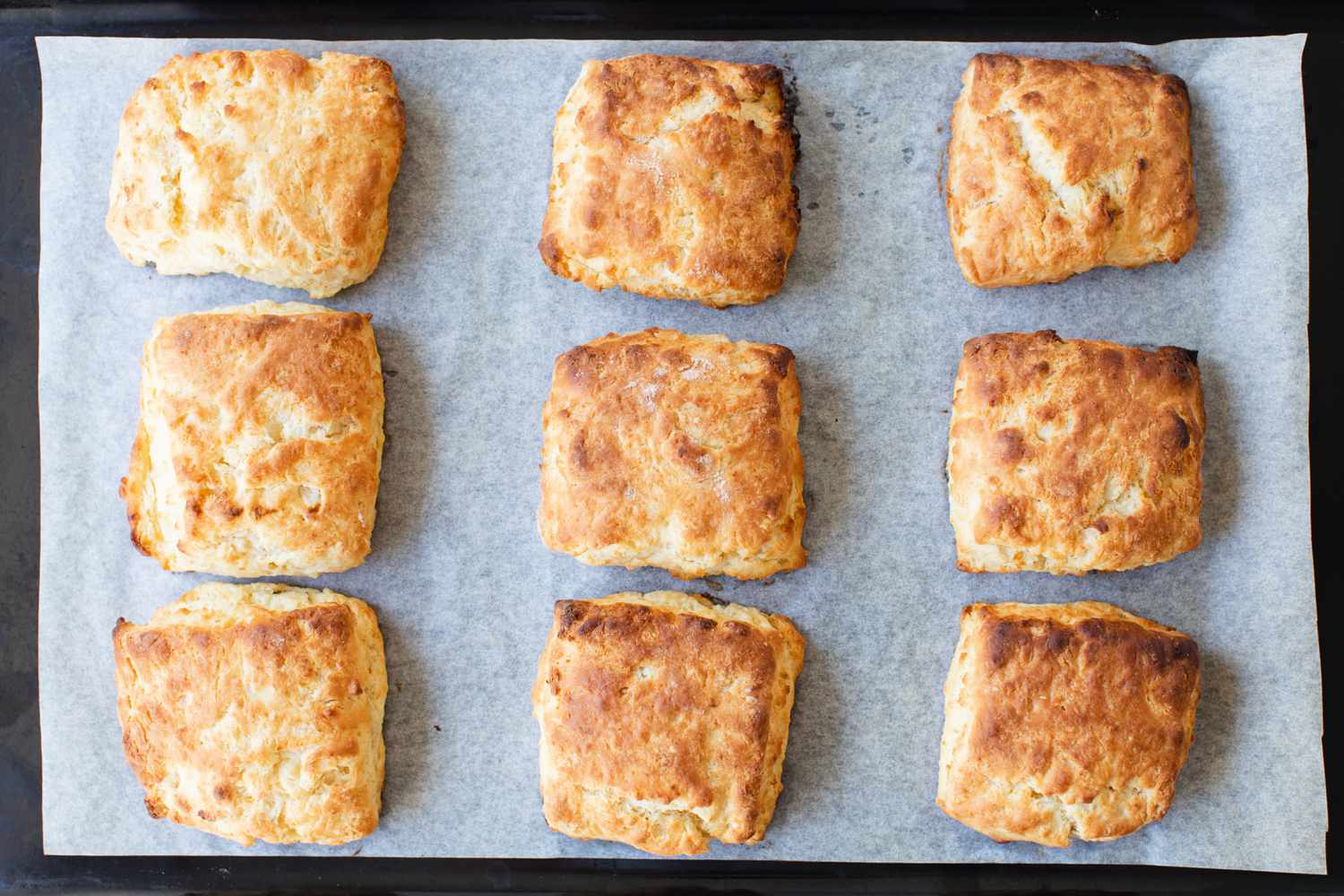 Baked Shortcake Biscuits on a parchment lined pan