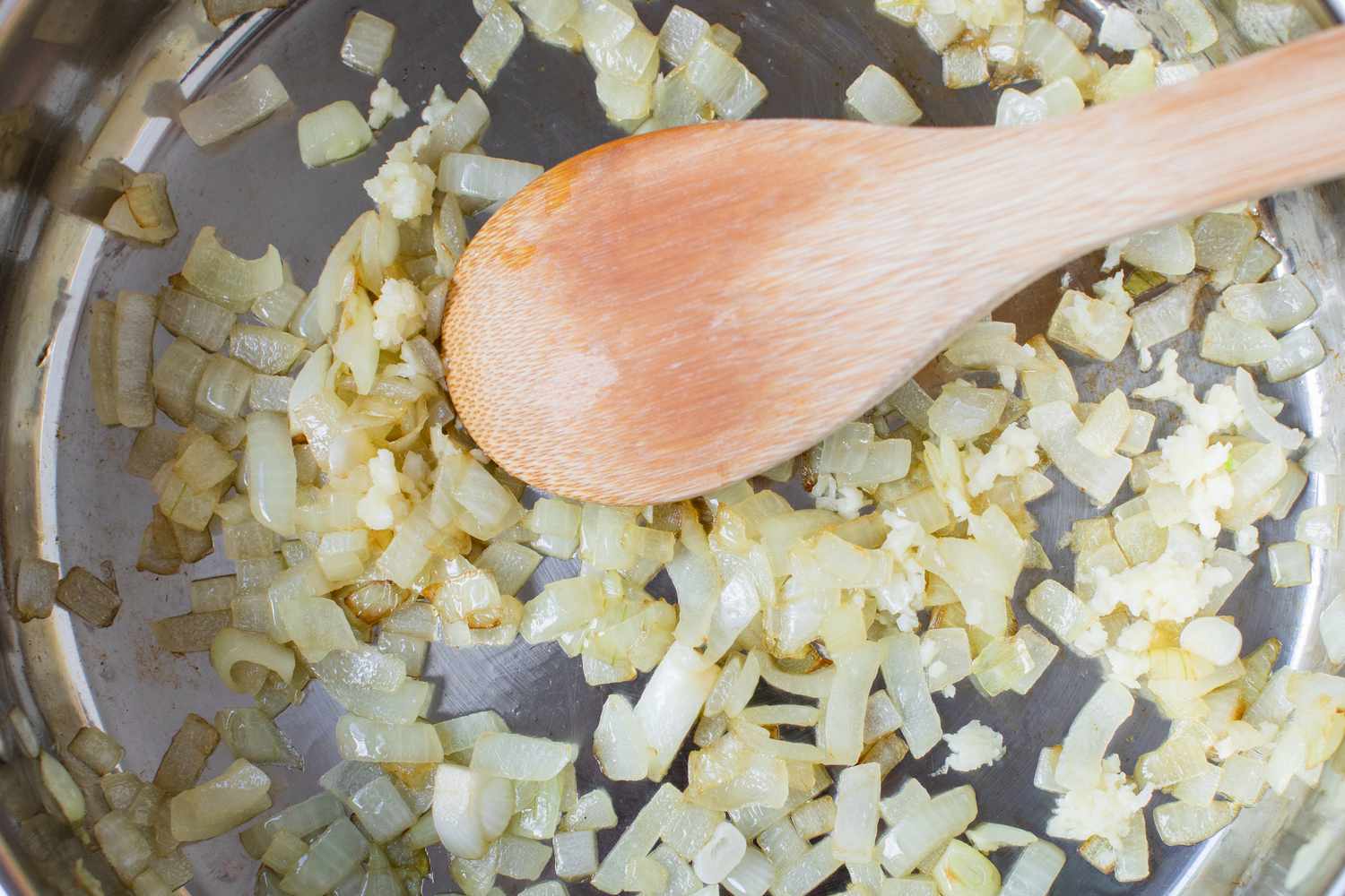Cooking onions in a skillet for Italian Sausage Spaghetti