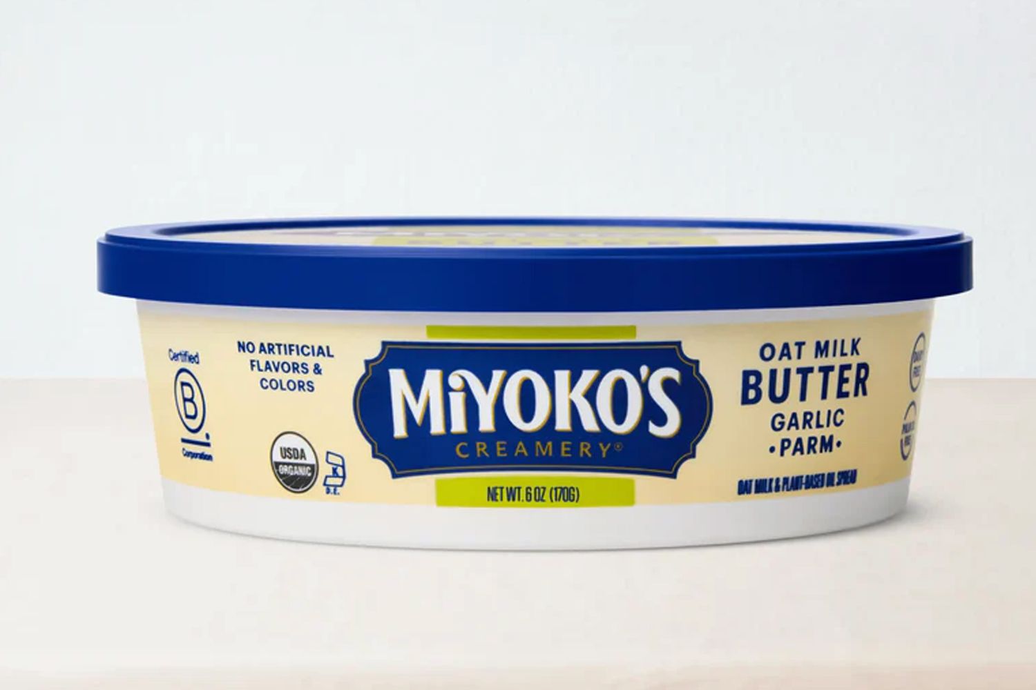 A container of Miyoko's Creamery oat milk garlic Parm butter.