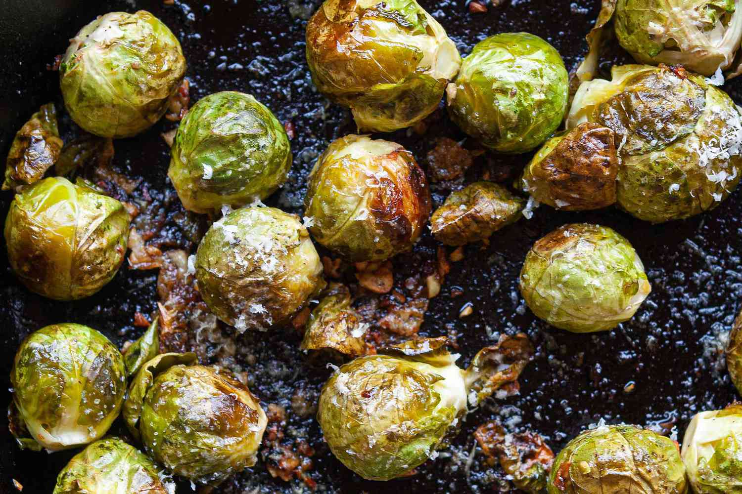 Close up shot of roasted brussel sprouts in a skillet