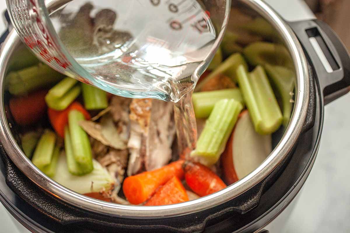Pressure Cooker Chicken Stock vegetables and chicken bones