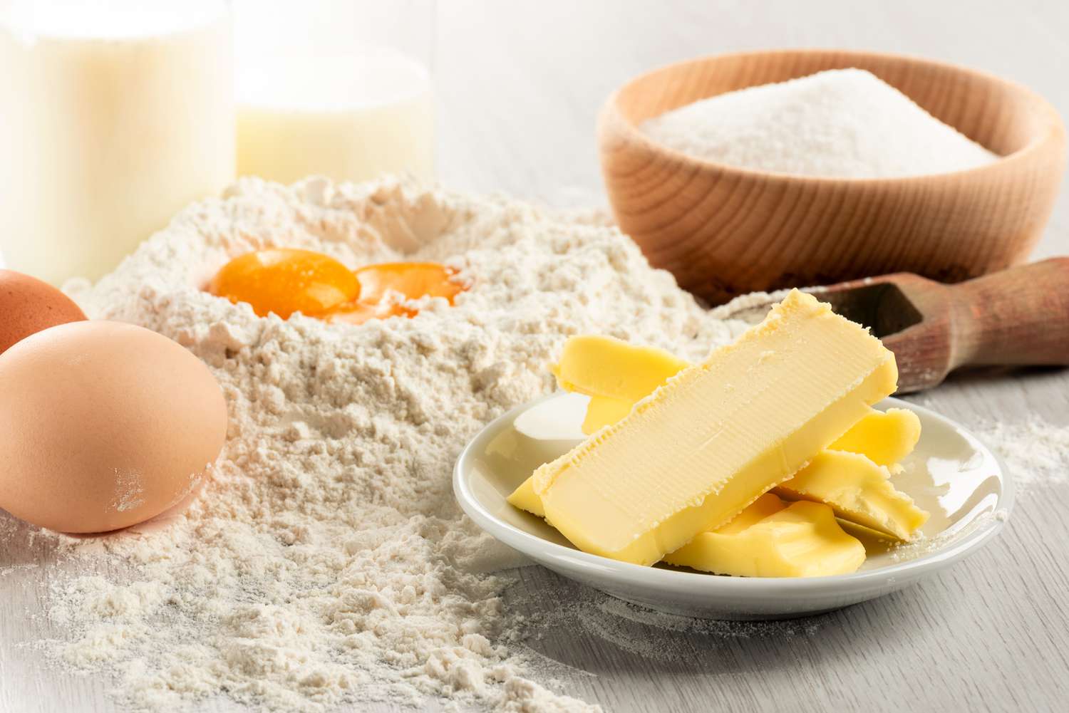 Ingredients for dough and pastry on wooden table
