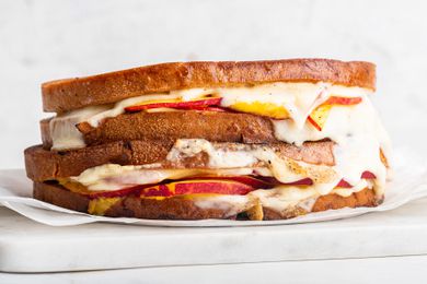 nectarine grilled cheese on a parchment paper