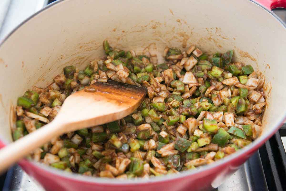 Make sure all the vegetables are coated with roux and spices