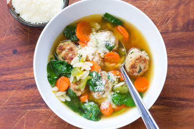 Turkey Meatball Soup in a white bowl with a spoon