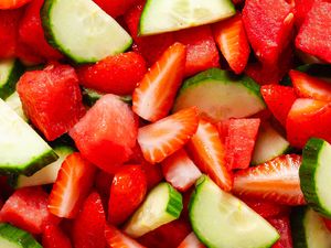 close up view of Hydration Salad - watermelon pieces, sliced strawberries, and sliced cucumbers