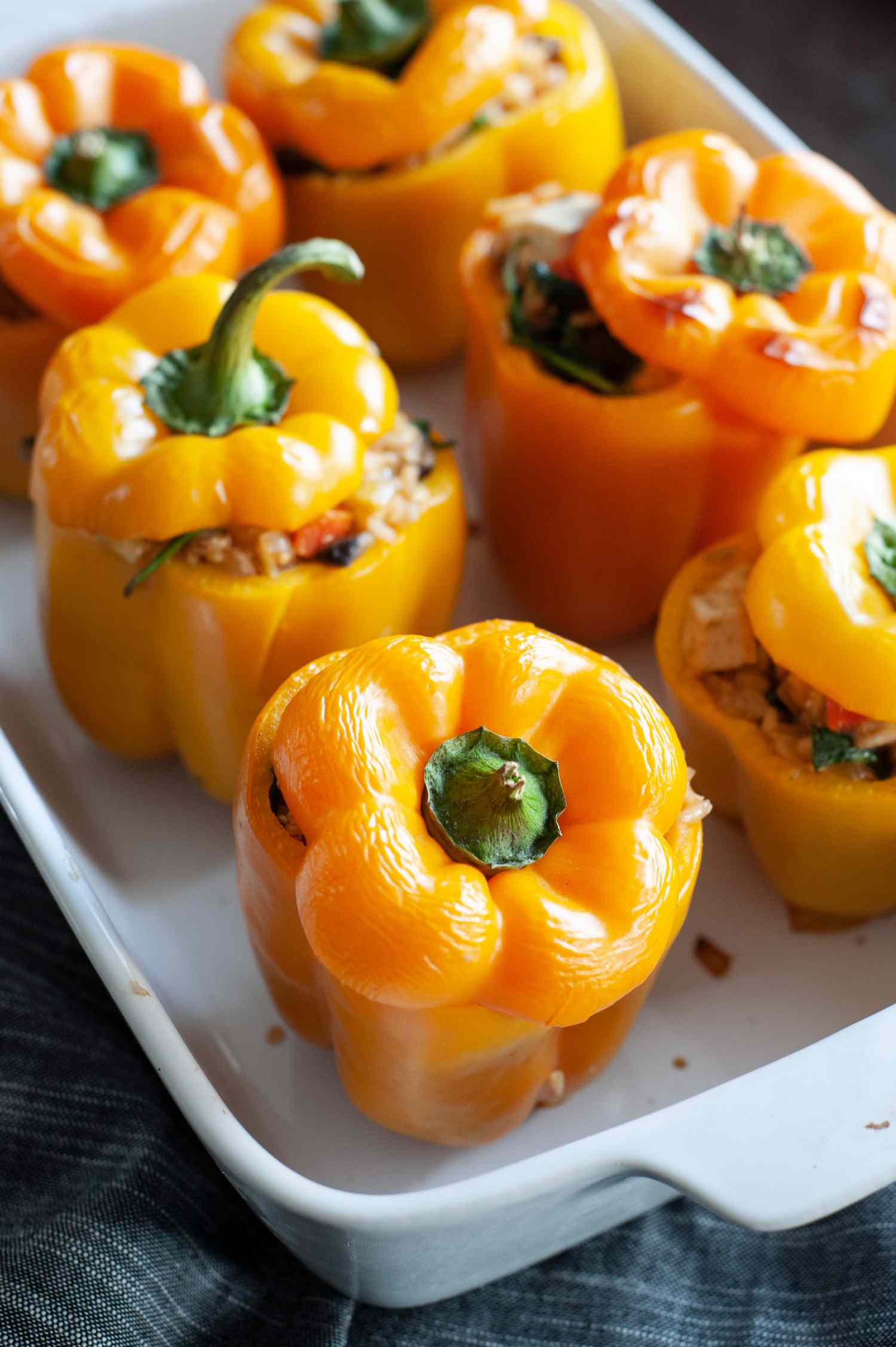 Vegetarian Stuffed Peppers in casserole dish