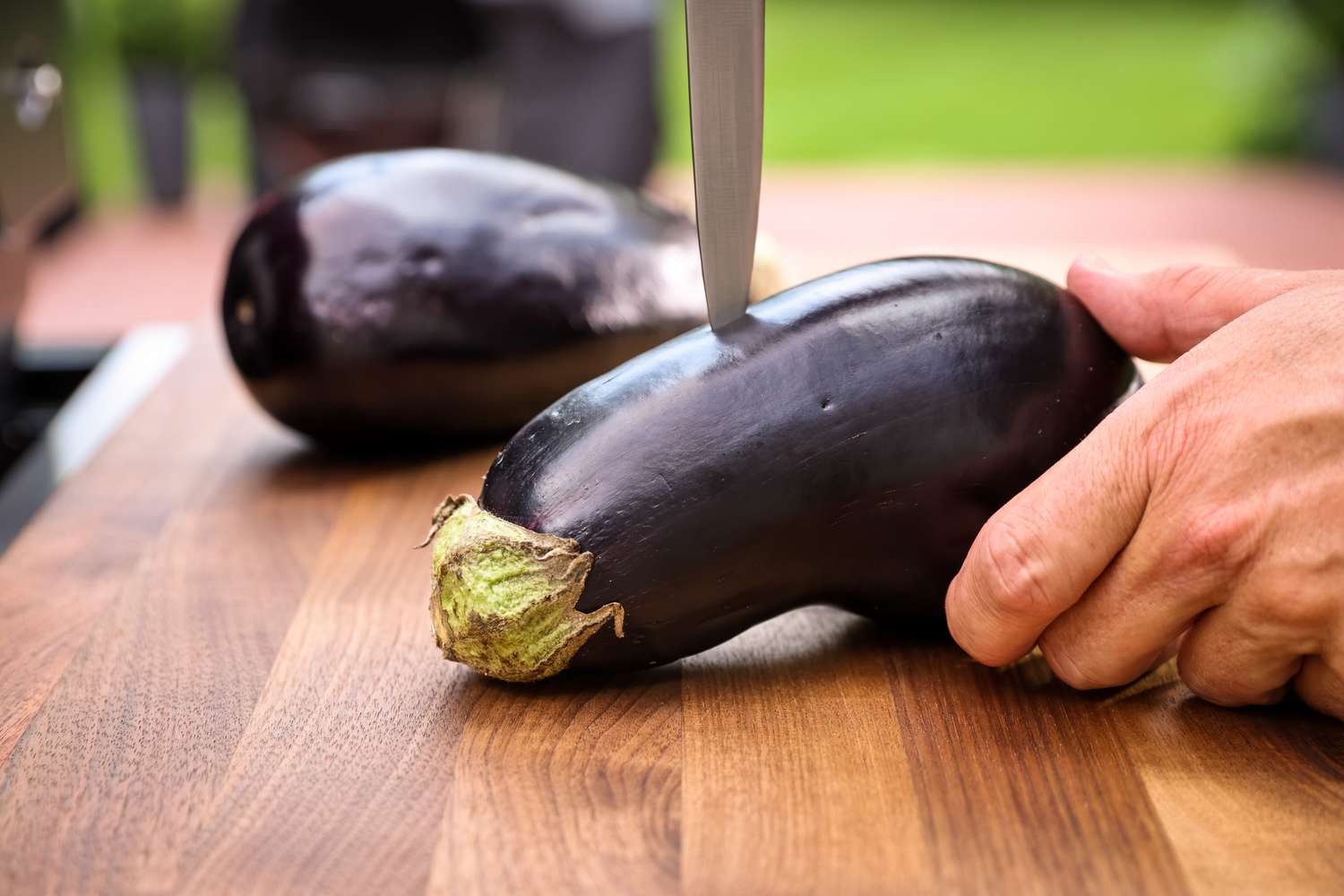 Eggplant Pierced on Cutting Board for Grilling Recipe 