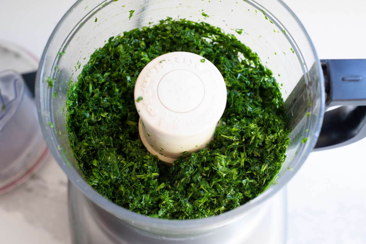 Pulse until the herbs are finely chopped.