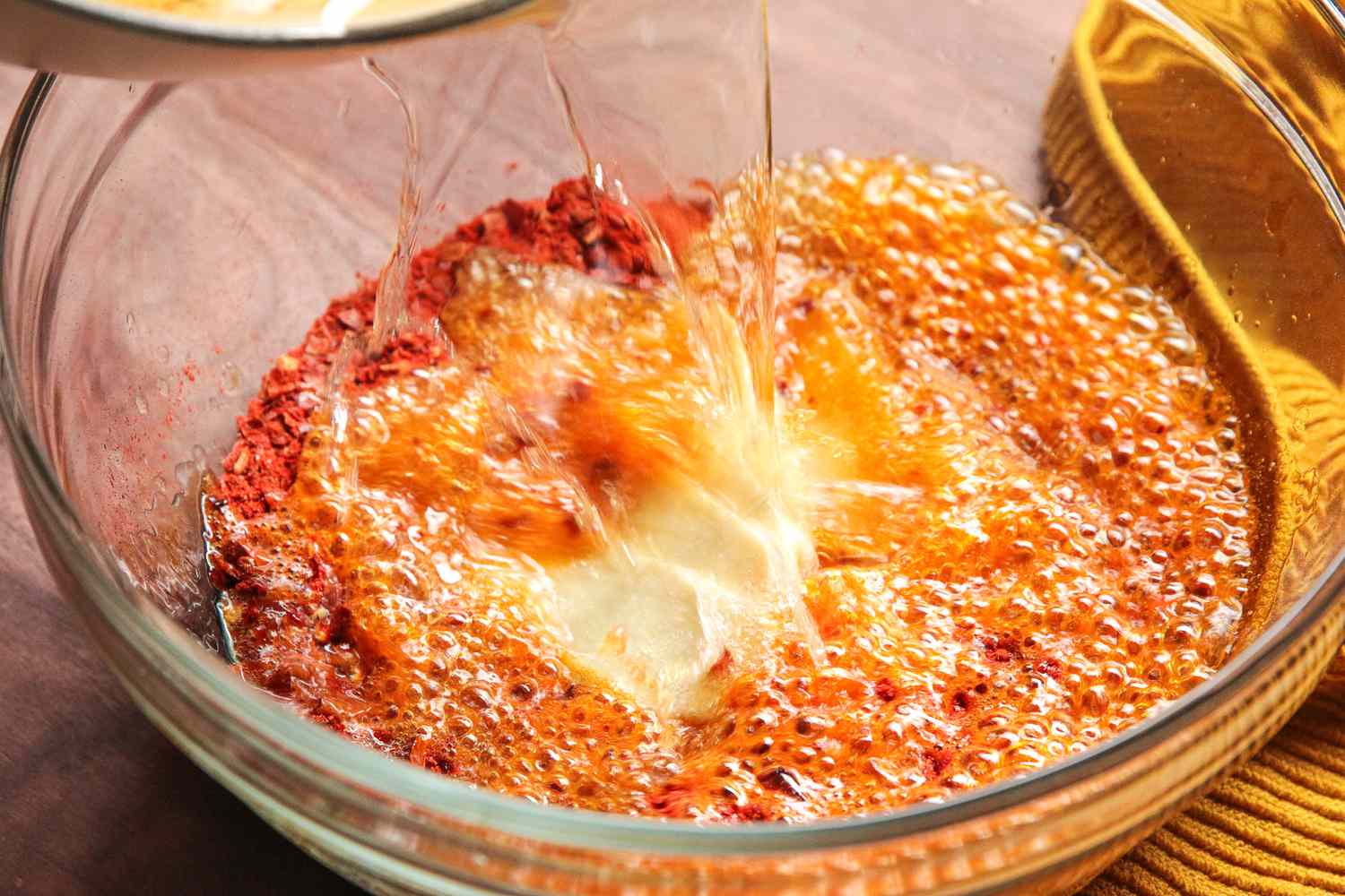 Hot Oil Poured Into the Bowl of Pepper Mix and Ginger