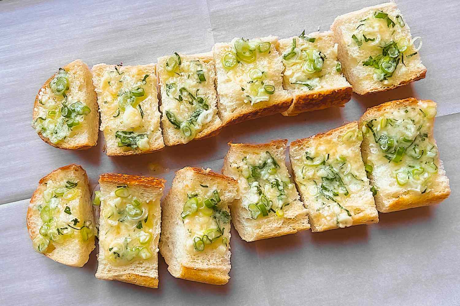 Garlic bread on parchment paper