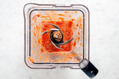 blender with tomato sauce in it (overhead shot)