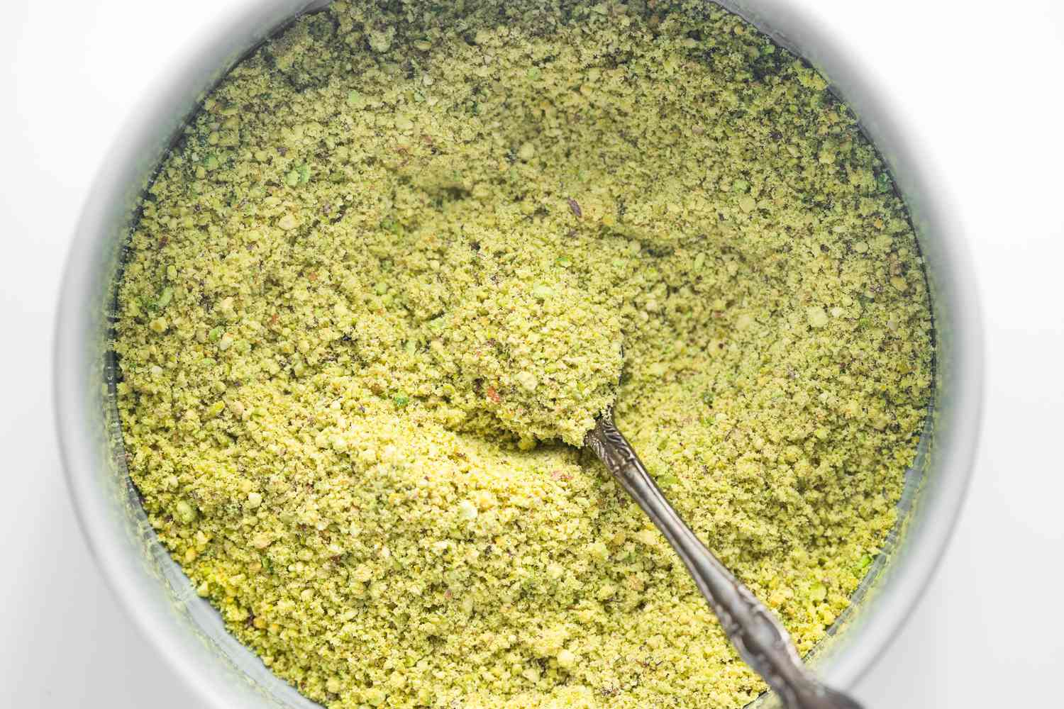 Bowl of Ground Pistachios for Tres Leches Cake