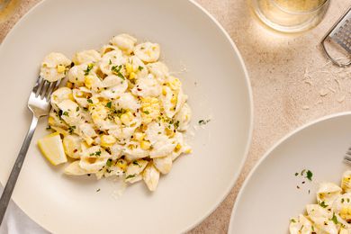 Bowls of Fresh Corn Pasta with a Fork