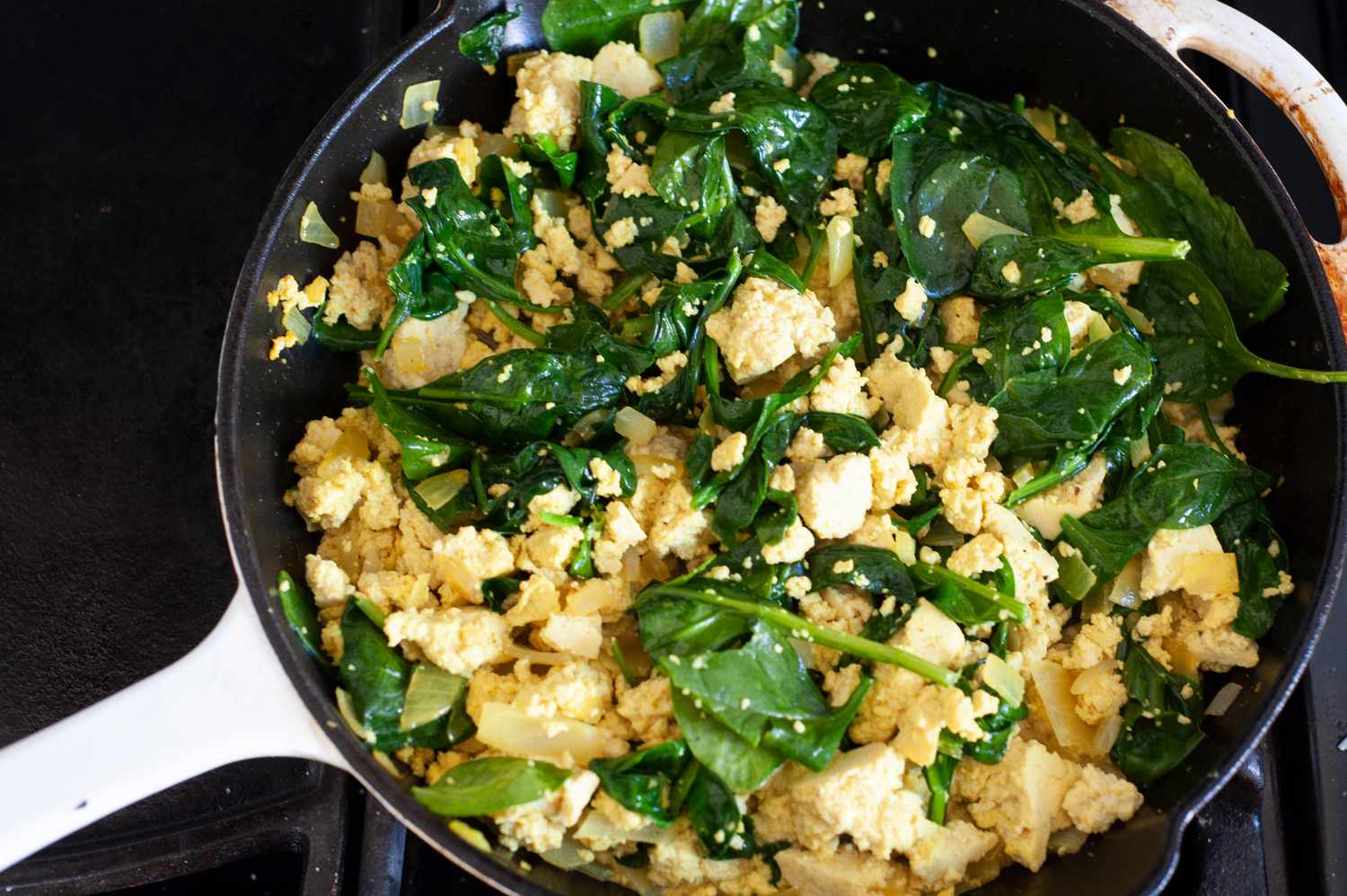 Add the spinach to the tofu until wilted.