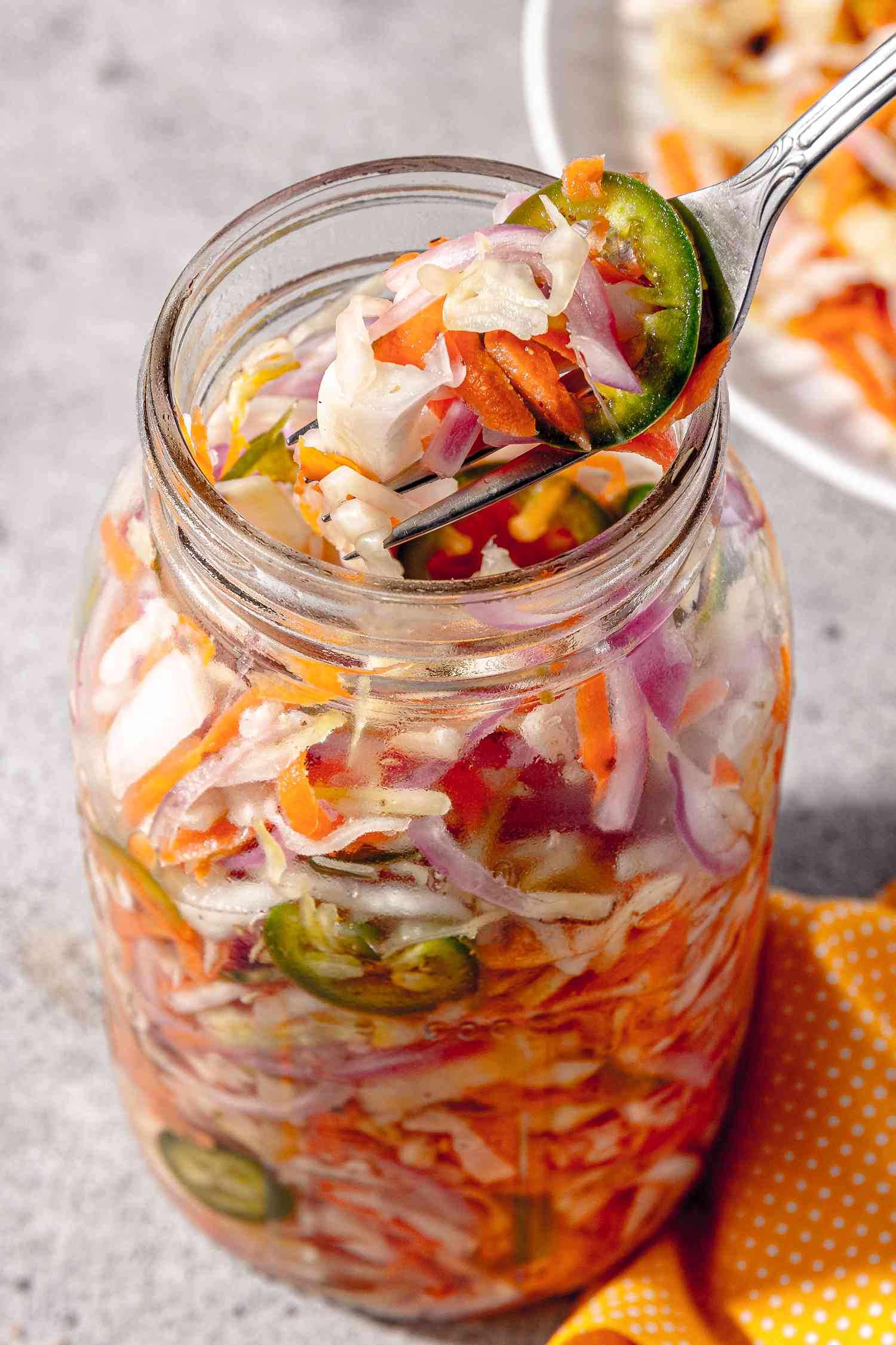 Jar of Curtido with Some on a Fork