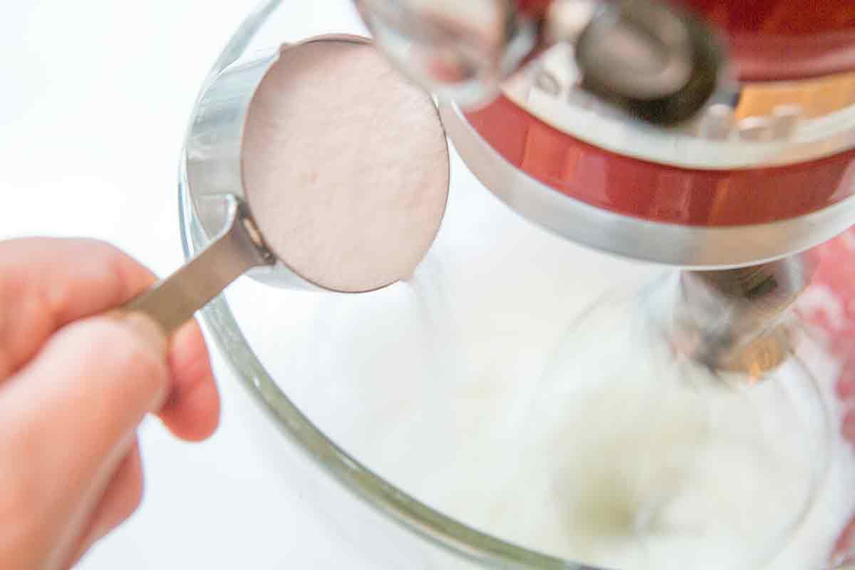 sprinkle with sugar as you are are beating the egg whites to slowly build the whipped egg whites for the cake