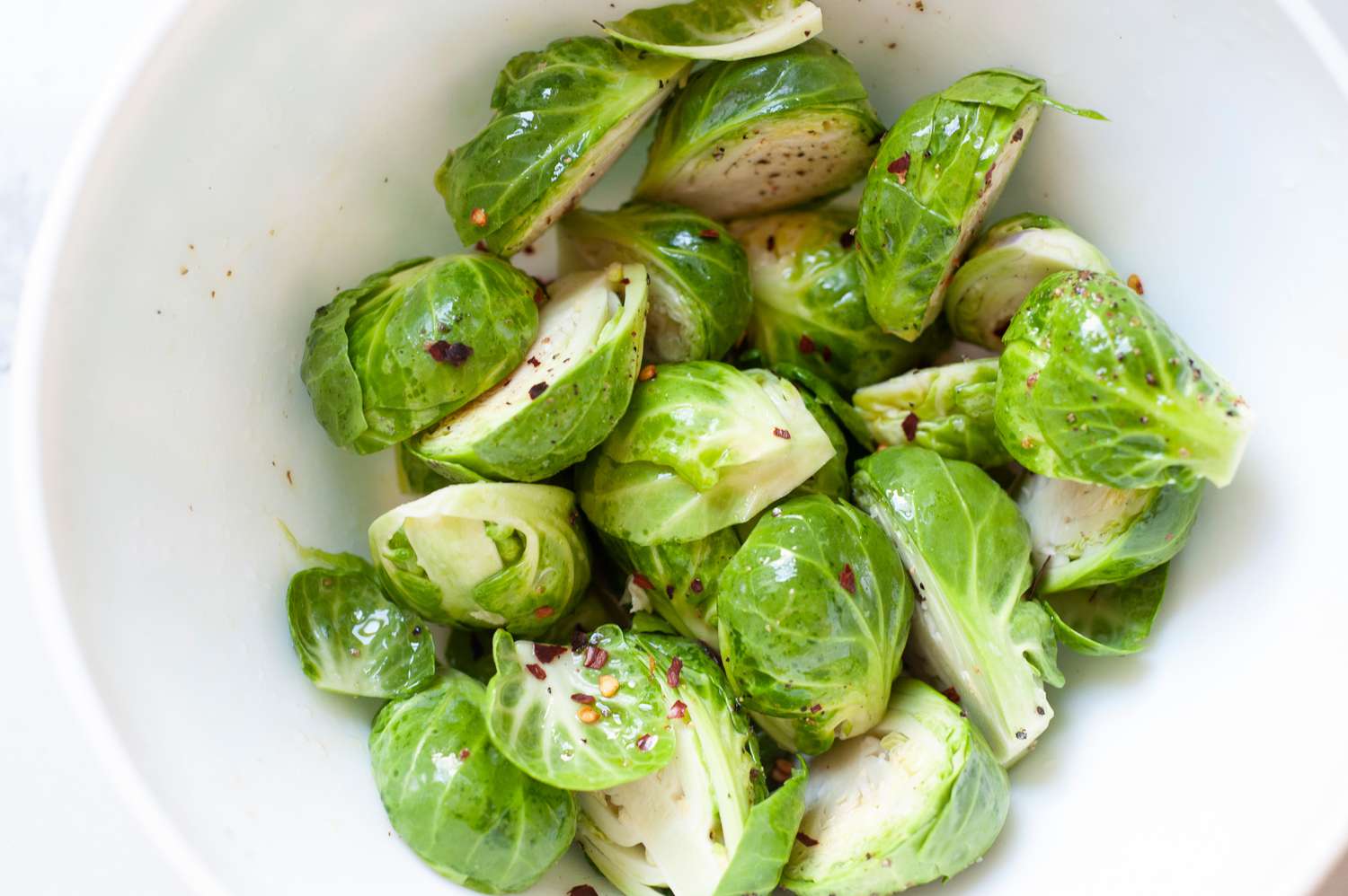 Brussels Sprouts Seasoned in a Bowl