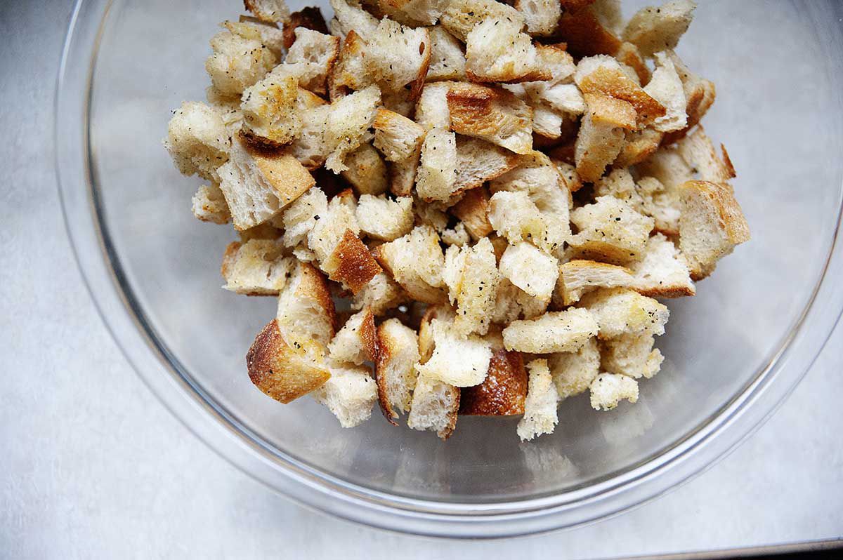 Toasted breadcrumbs in large glass bowl.