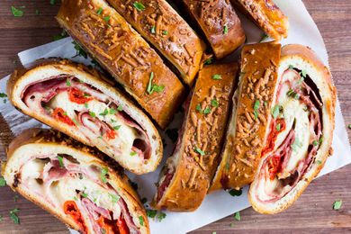 Slices of homemade stromboli on a cutting board