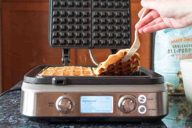 Use a fork to lift the finished waffles out of the waffle iron