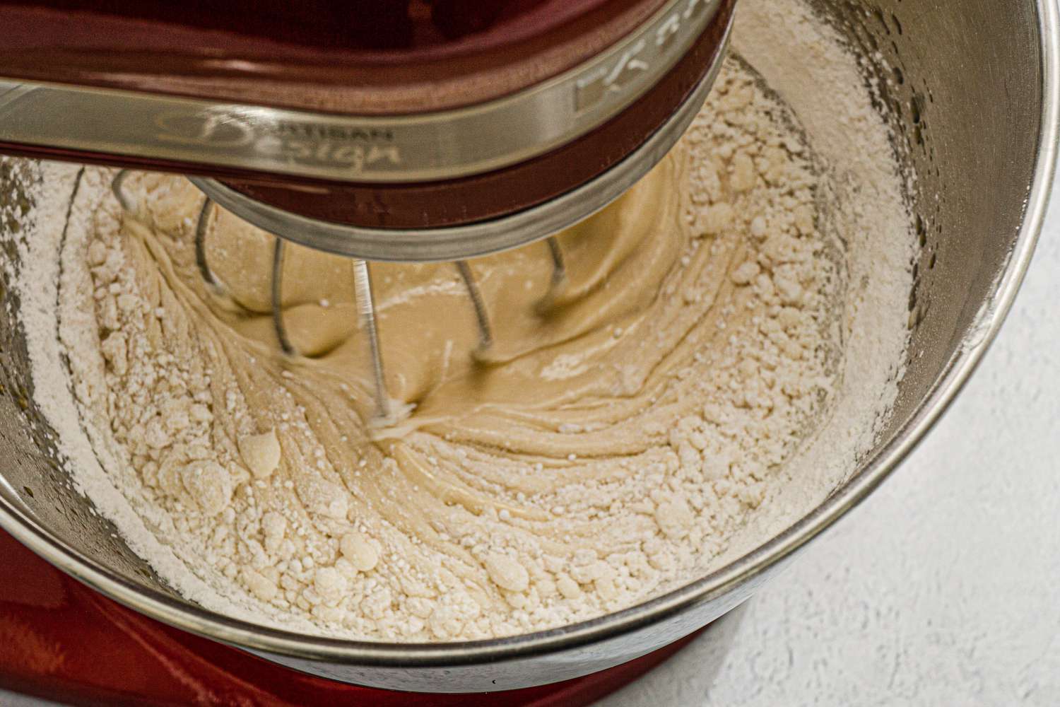 Add dry ingredients to cake batter.